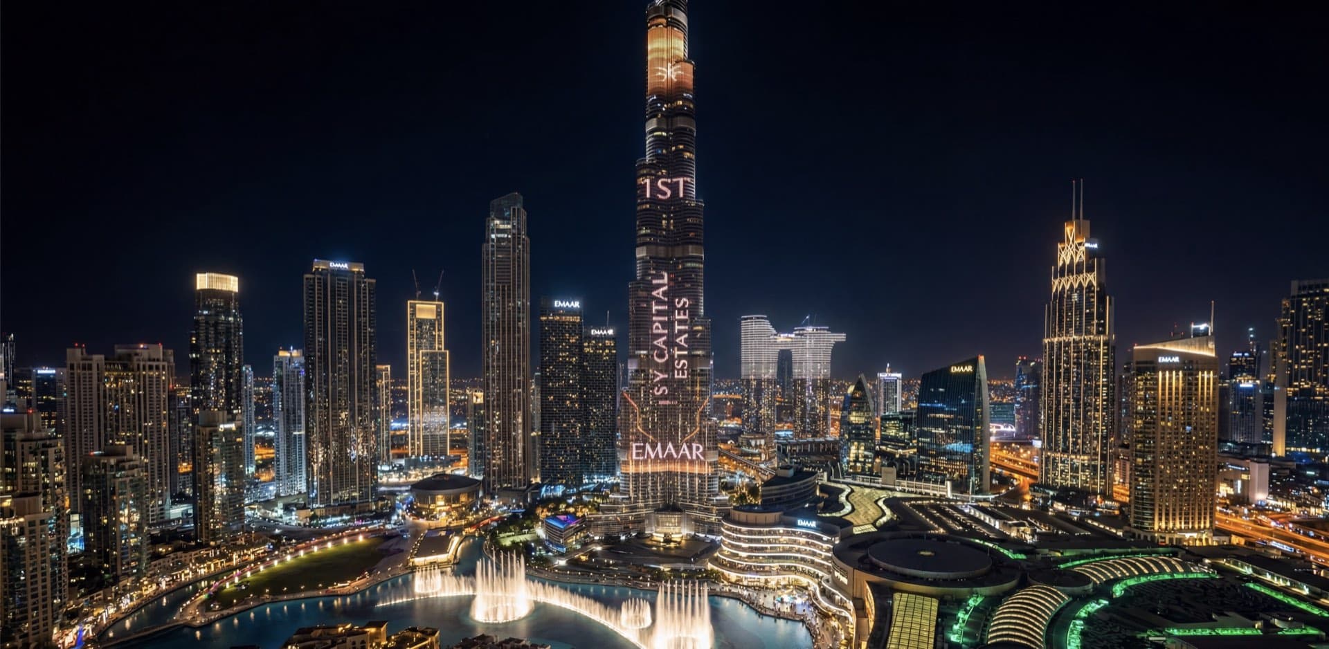 Downtown Dubai at night, with the Burj Khalifa lit up to celebrate SY Capital Estates’ 1st place at the Emaar Annual Broker Awards