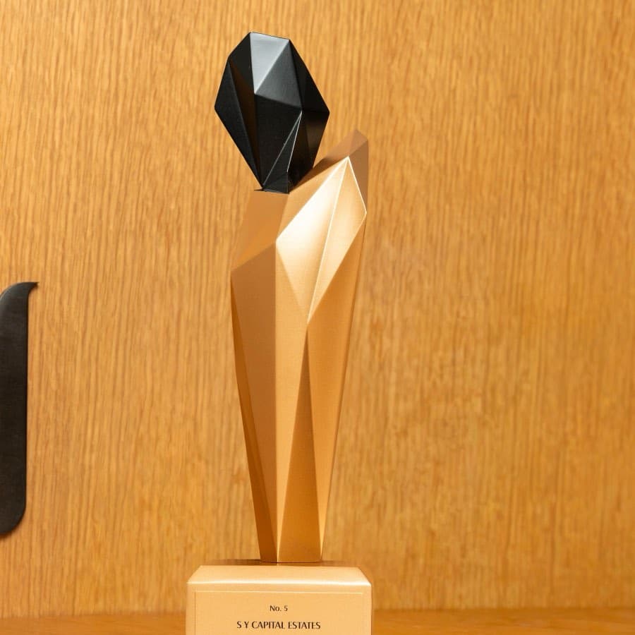 The Emaar Annual Broker Awards trophy awarded to SY Capital Estates for No. 5 in 2024