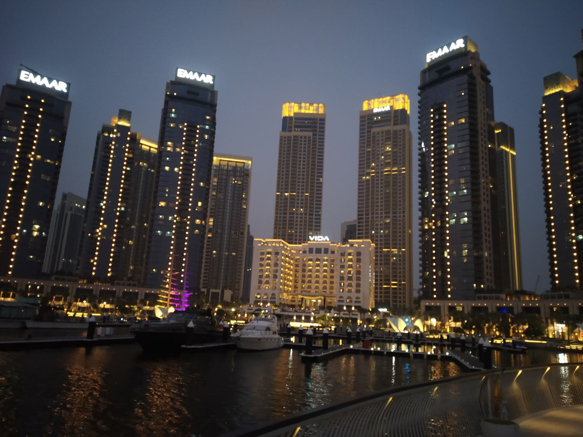 Completed Emaar residential towers on the waterfront at Dubai Creek Harbour at dusk