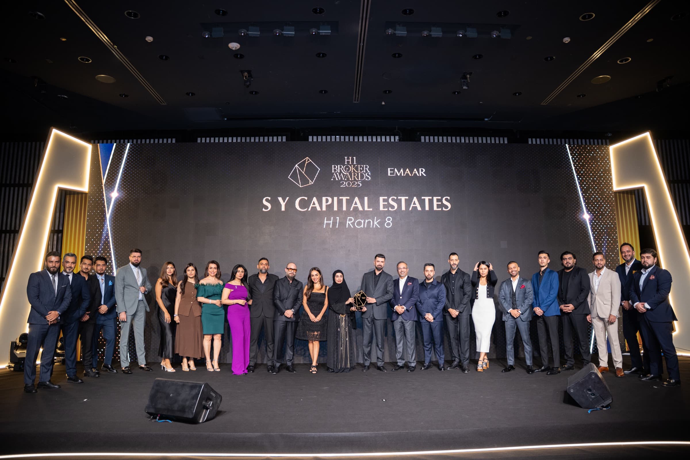 The SY Capital Estates team on stage at the Emaar H1 Broker Awards 2025, ranked 8th