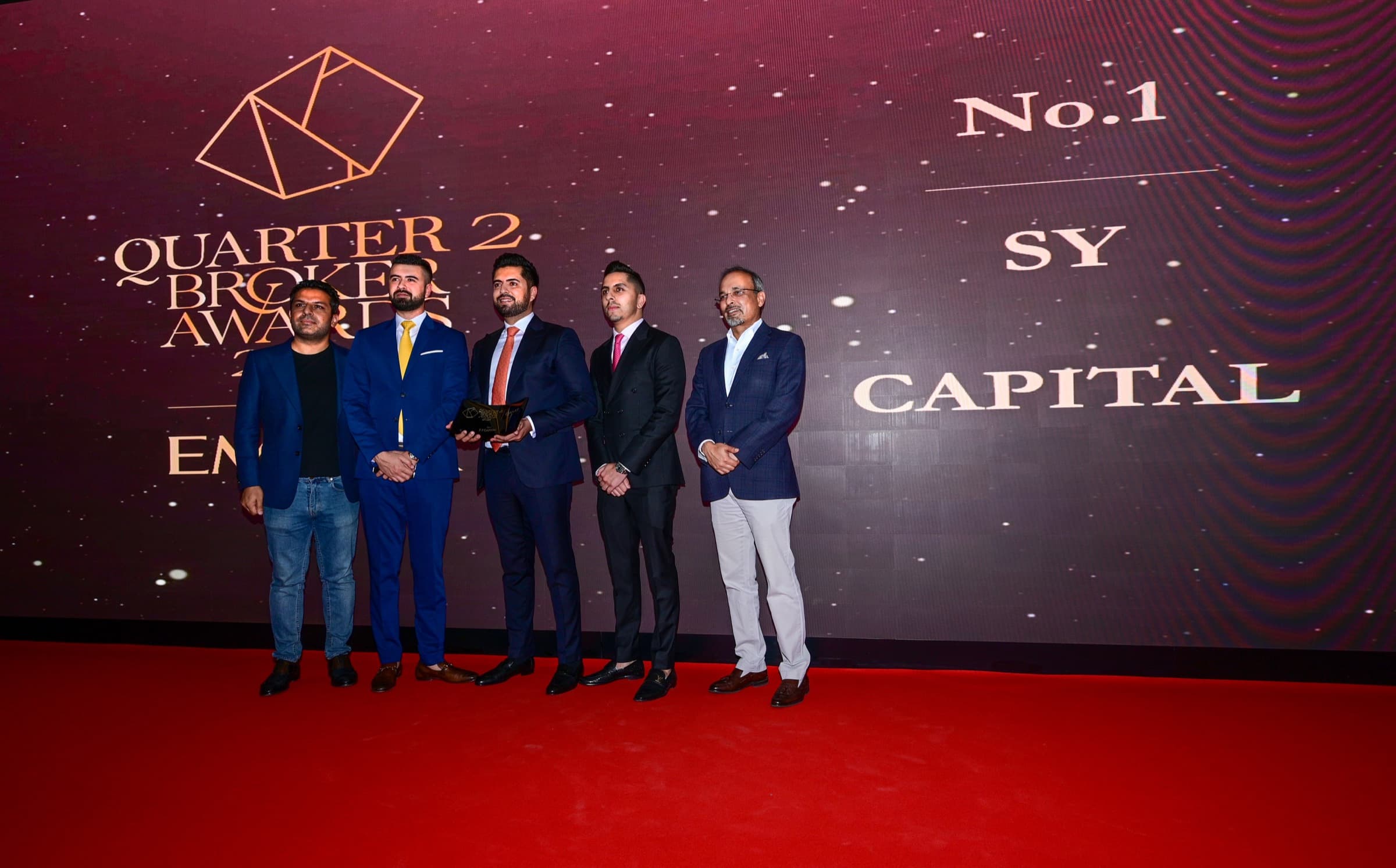SY Capital Estates leadership receiving the No.1 award at the Emaar Quarter 2 Broker Awards
