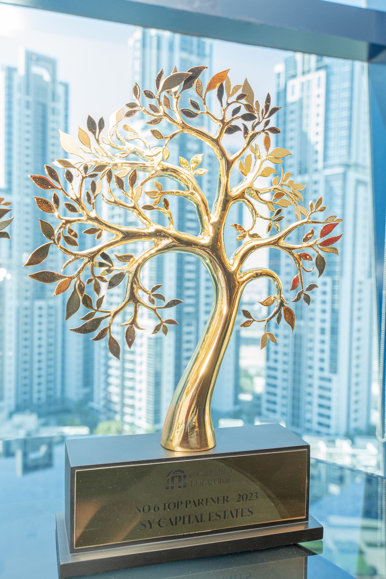 The Tilal Al Ghaf No. 6 Top Partner 2023 trophy awarded to SY Capital Estates
